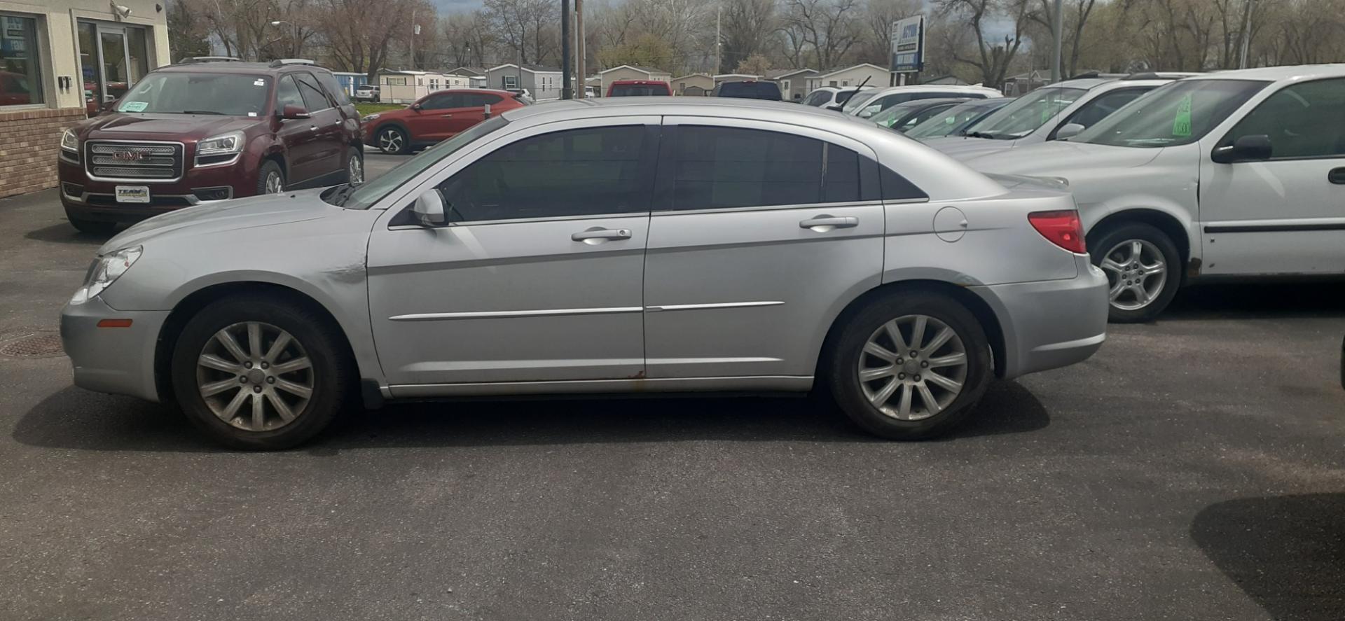 2010 Chrysler Sebring Sedan Limited (1C3CC5FB5AN) with an 2.4L L4 DOHC 16V engine, 4-Speed Automatic transmission, located at 2015 Cambell Street, Rapid City, SD, 57701, (605) 342-8326, 44.066433, -103.191772 - Photo#0